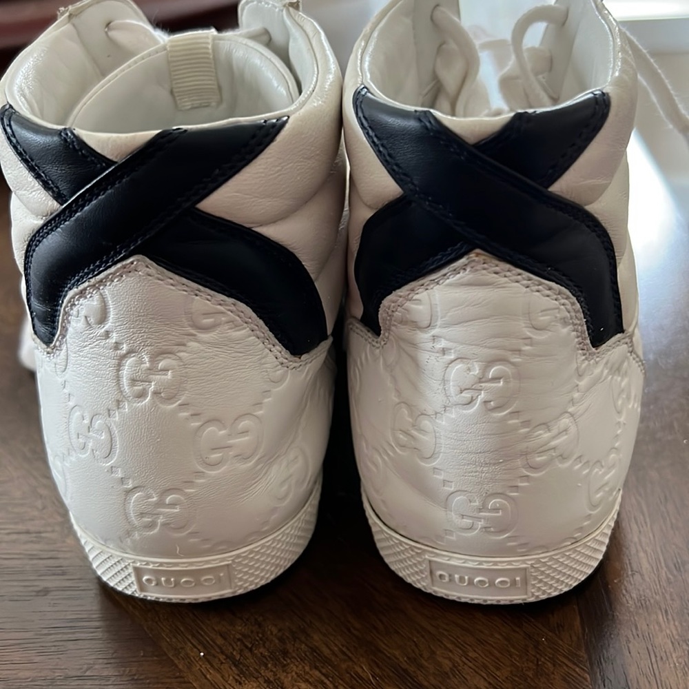 Gucci White High Top Tennis Shoes Lace Up. Men’s Size 7. Women’s size 8.5.